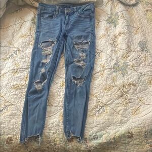 Distressed Blue Jeans